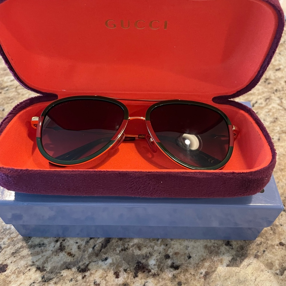 Gucci Sunglasses with Red and Green Accents